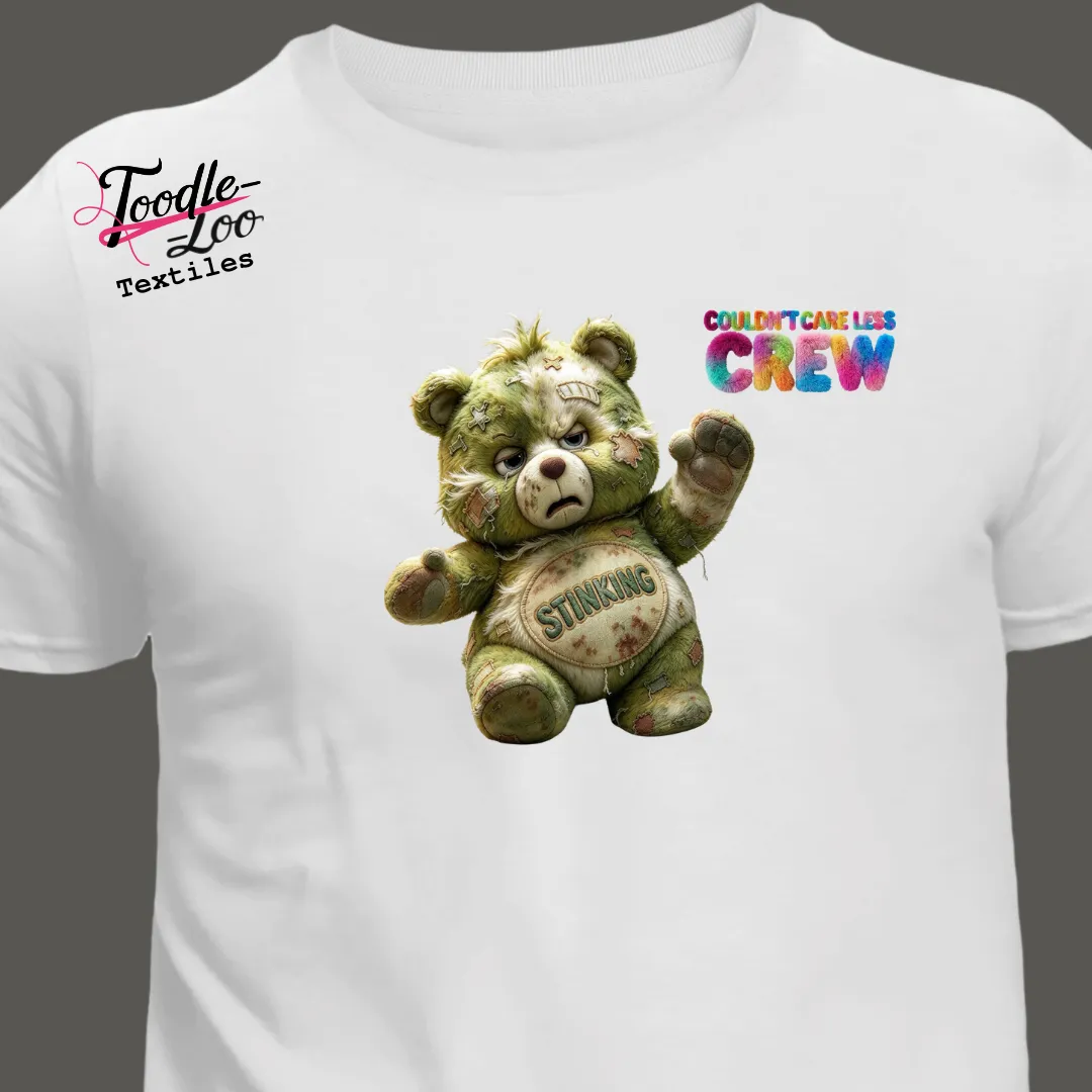 Stinking bear design on a white tee — Couldn’t Care Less Crew DTF print, shown as an AI mock-up